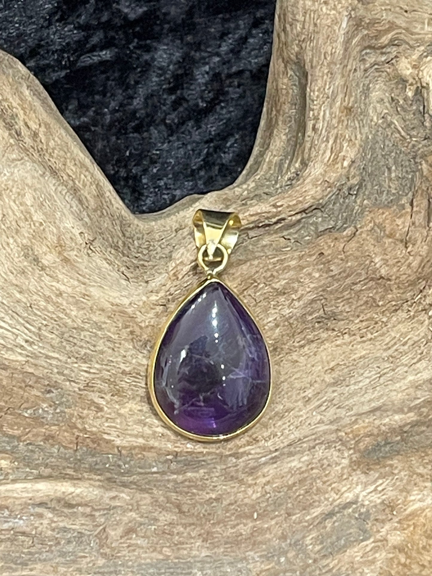 Bezel set crystal pendants
