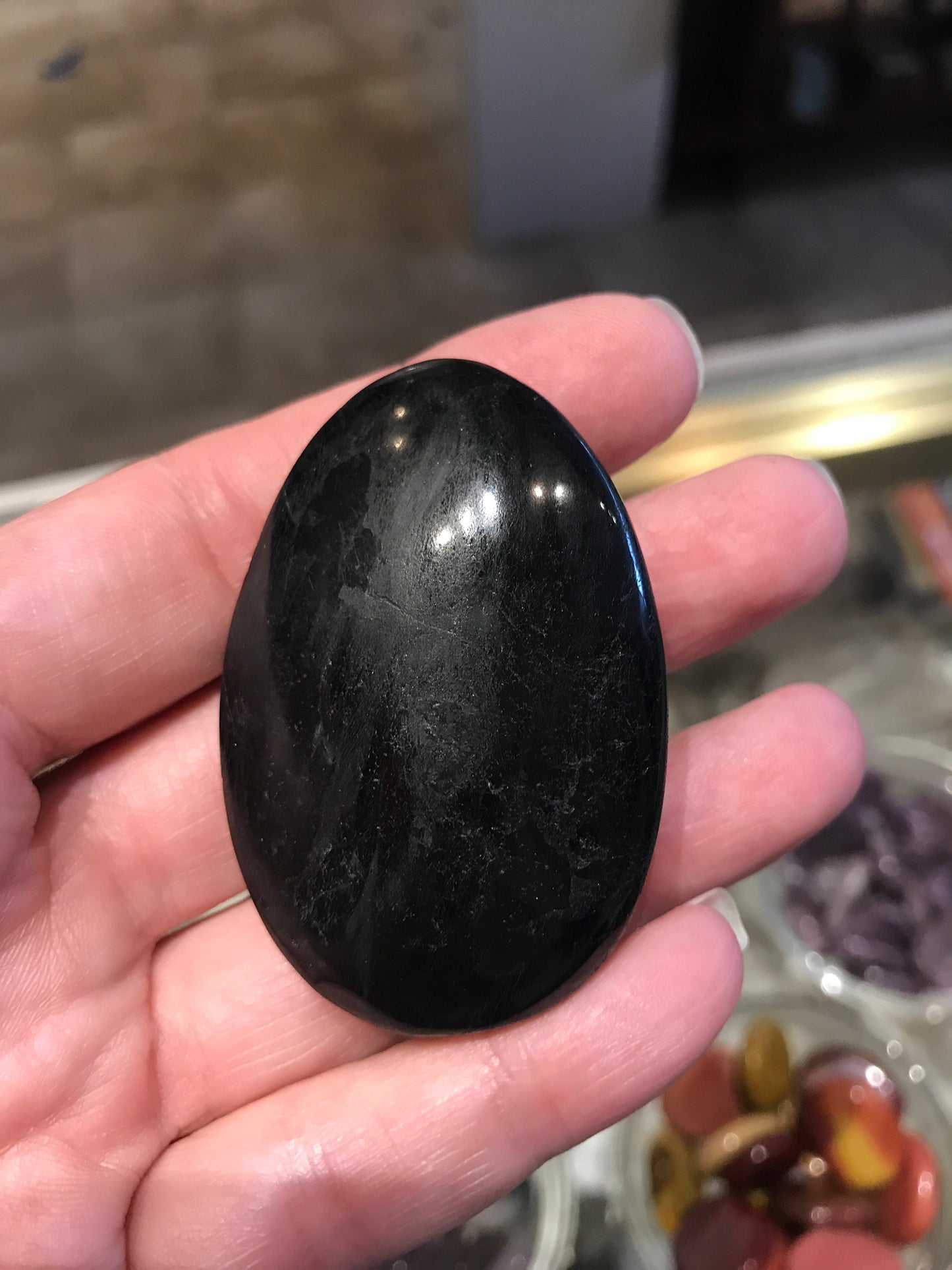 Black tourmaline palm stones