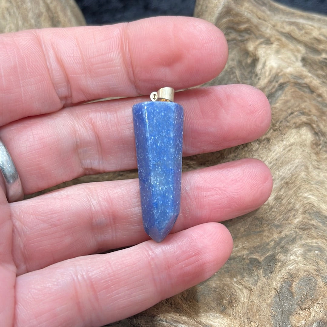 Points and Tumbled crystal pendants