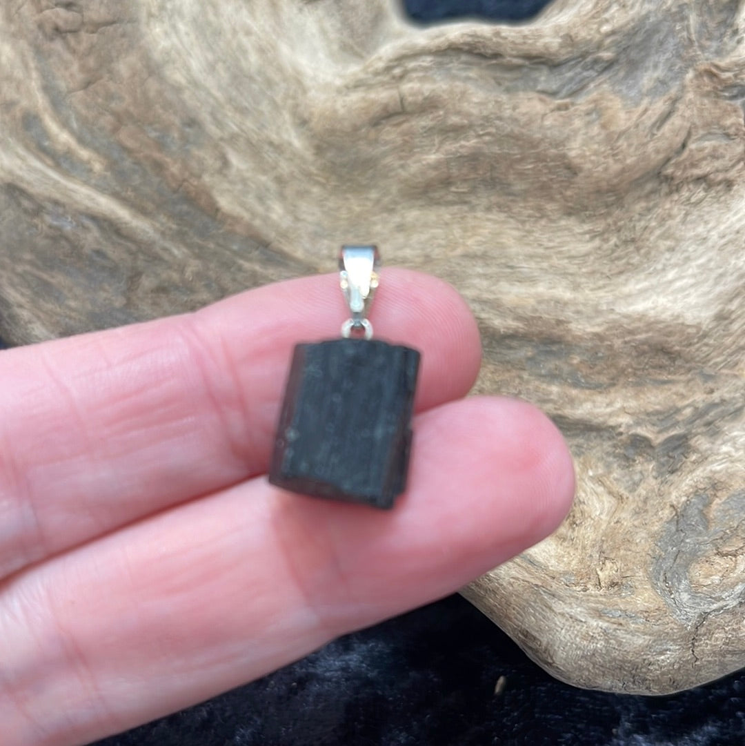 Points and Tumbled crystal pendants