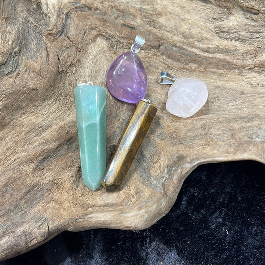 Points and Tumbled crystal pendants