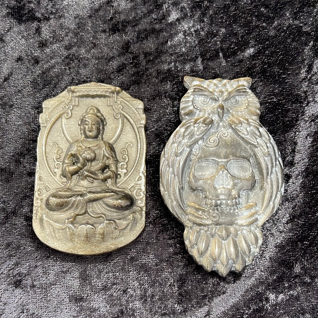 Gold sheen obsidian carvings