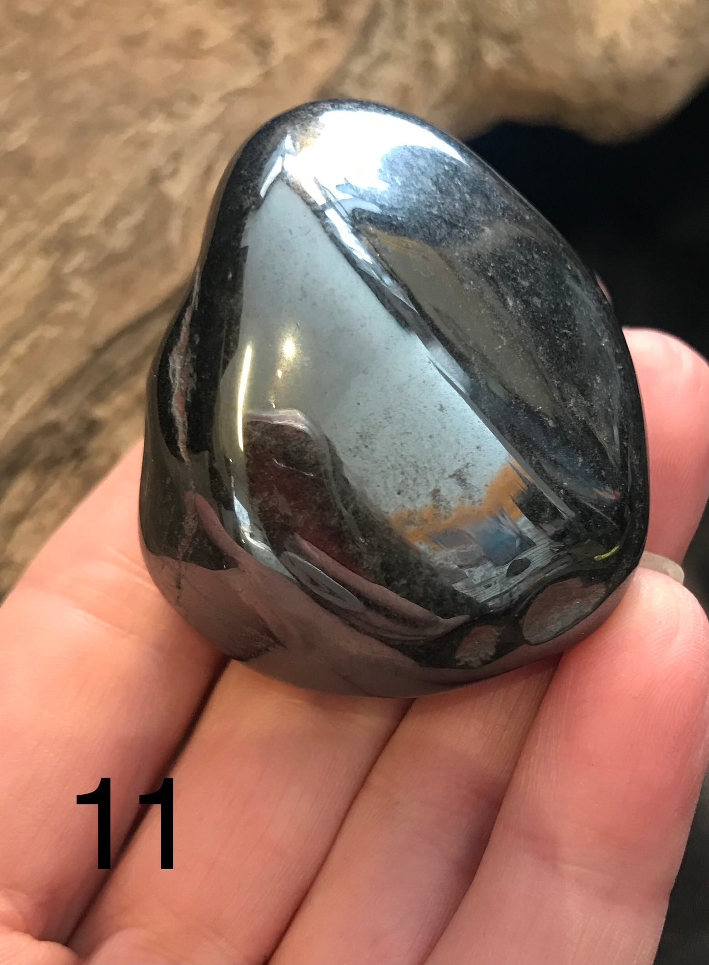 Hematite palm stone