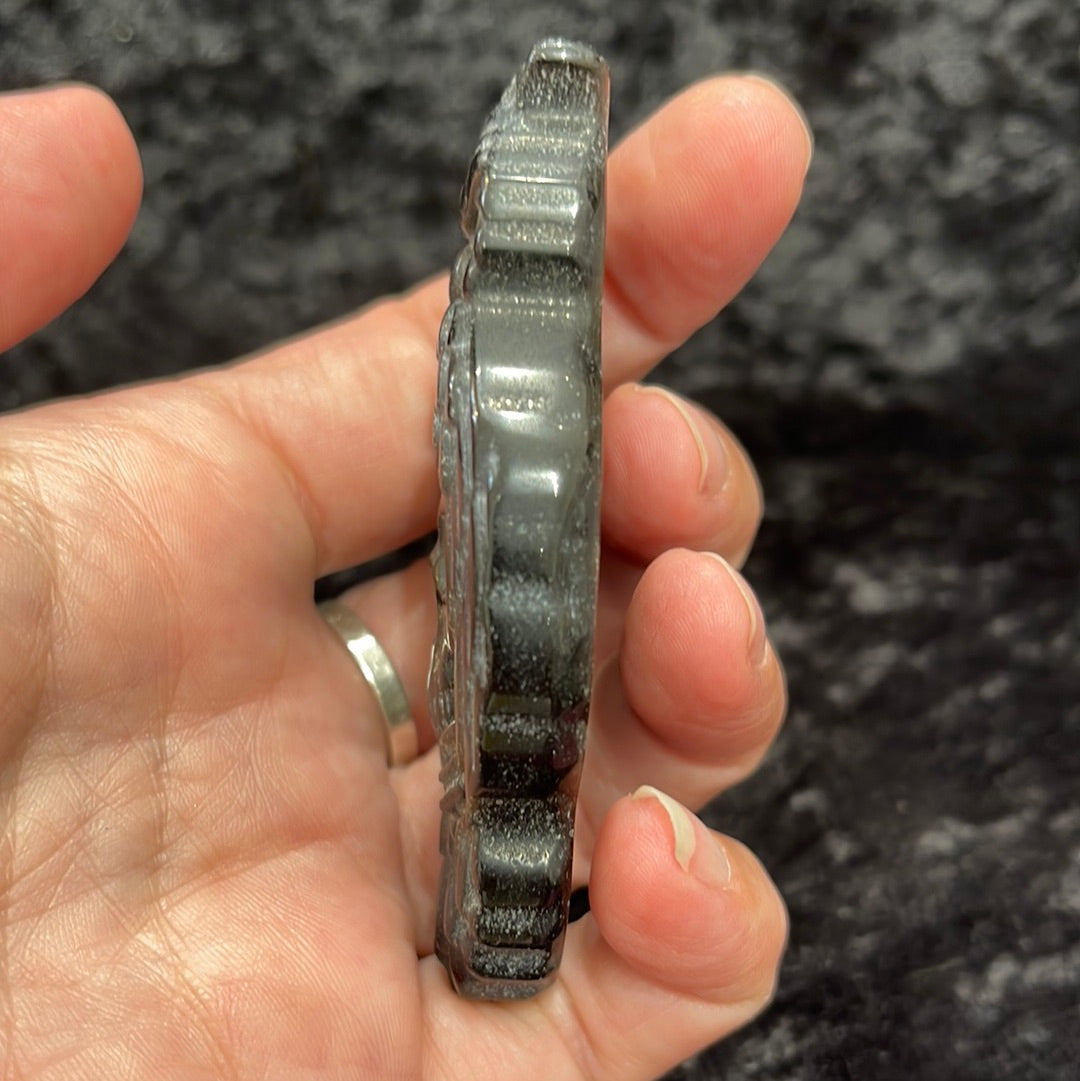 Gold sheen obsidian carvings