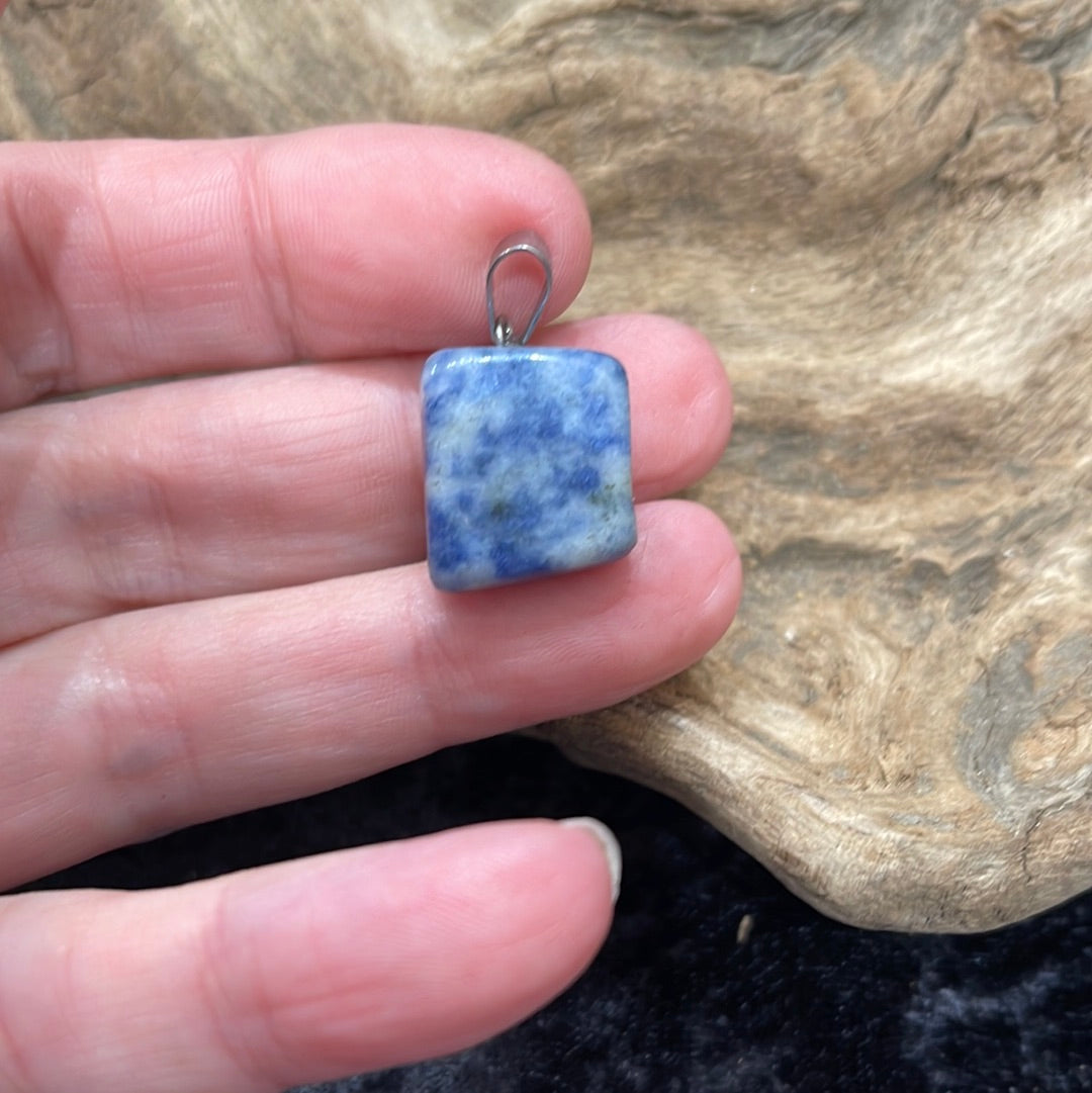 Points and Tumbled crystal pendants
