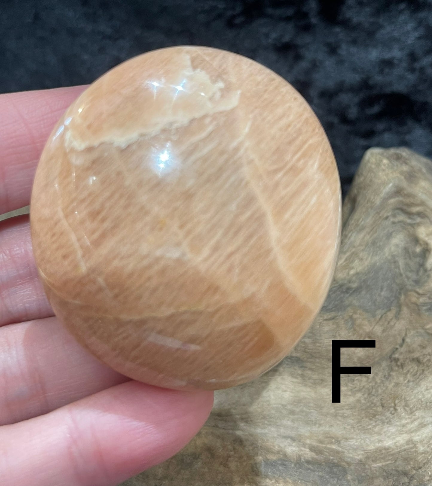 Peach Moonstone palm stones and spheres