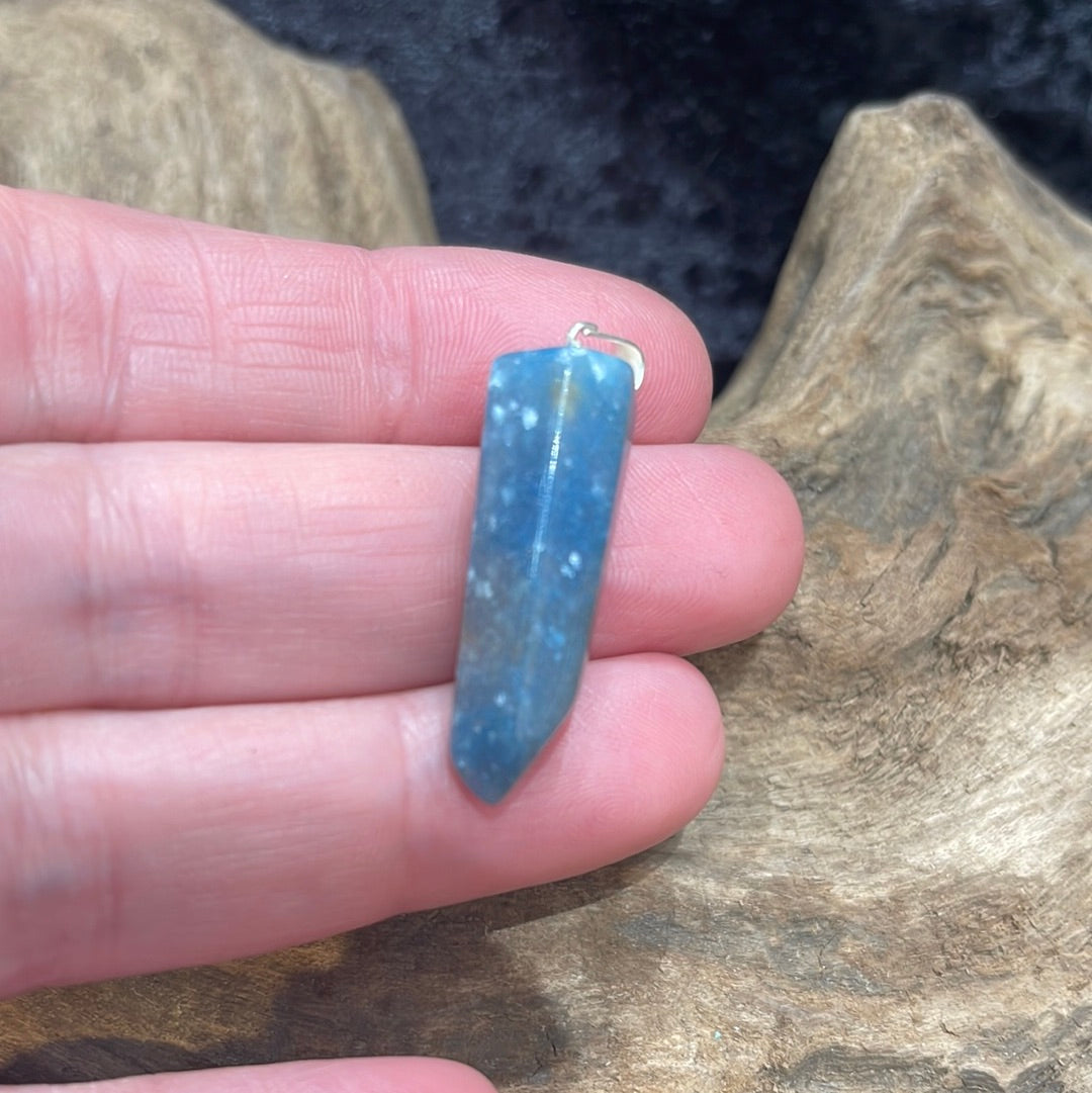 Points and Tumbled crystal pendants