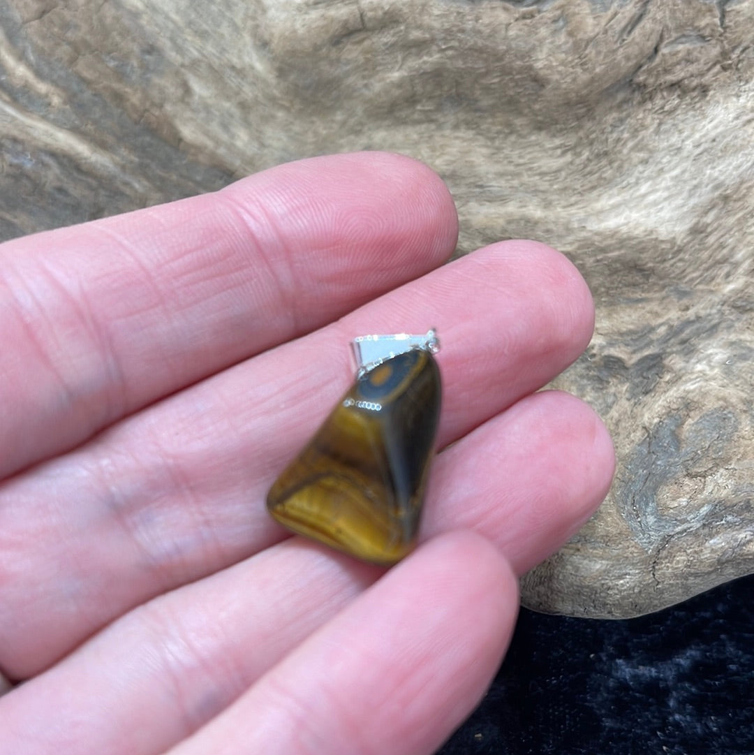 Points and Tumbled crystal pendants