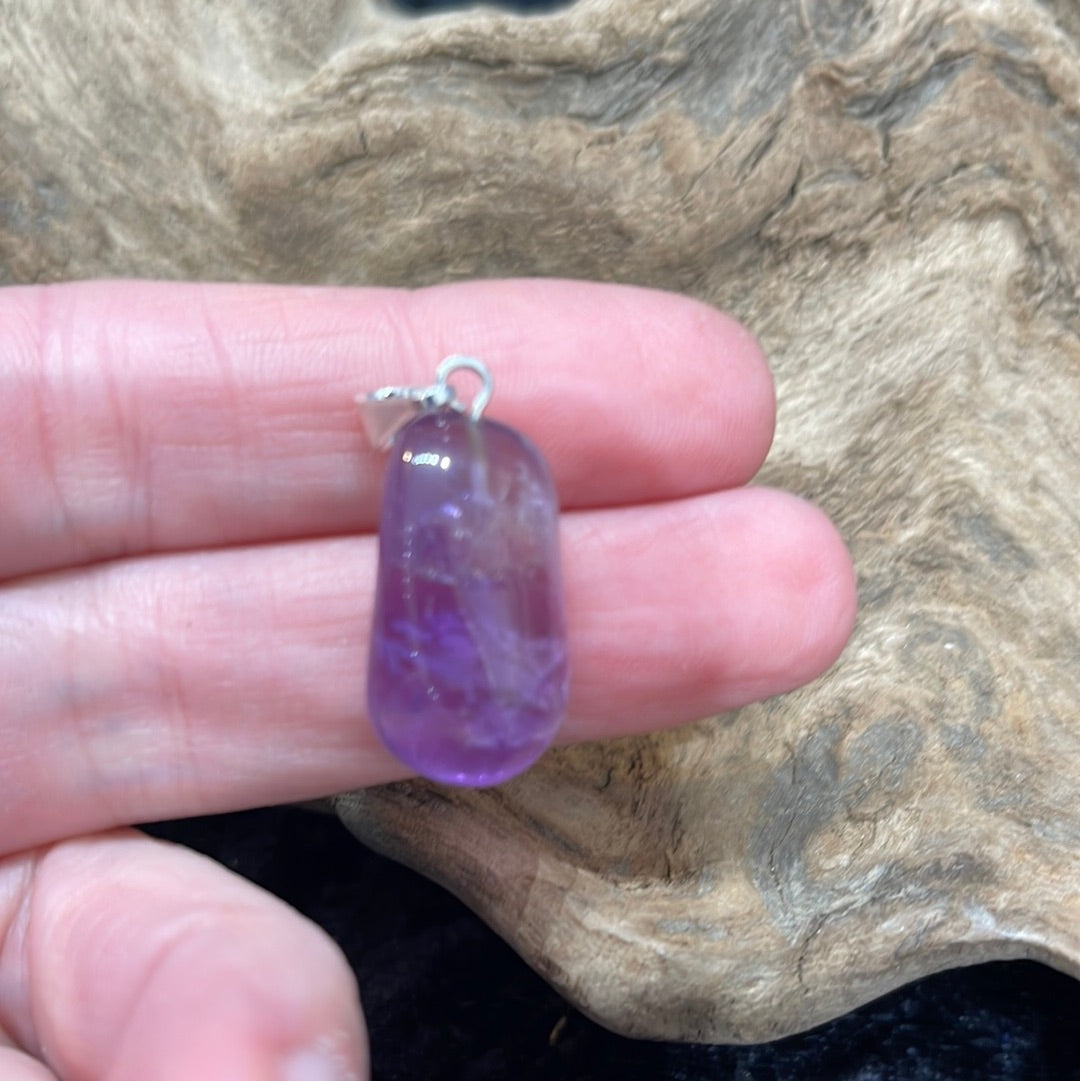 Points and Tumbled crystal pendants