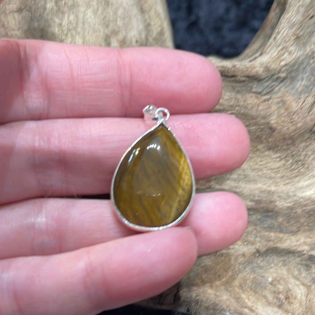 Bezel set crystal pendants