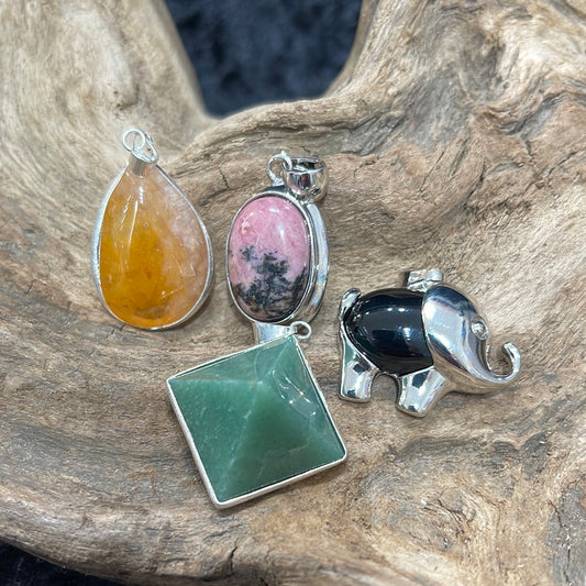 Bezel set crystal pendants