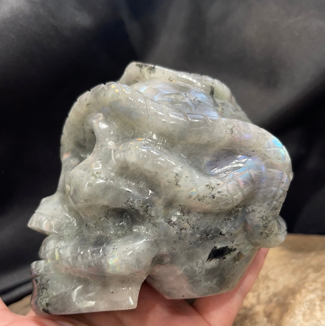 Labradorite skull with snake