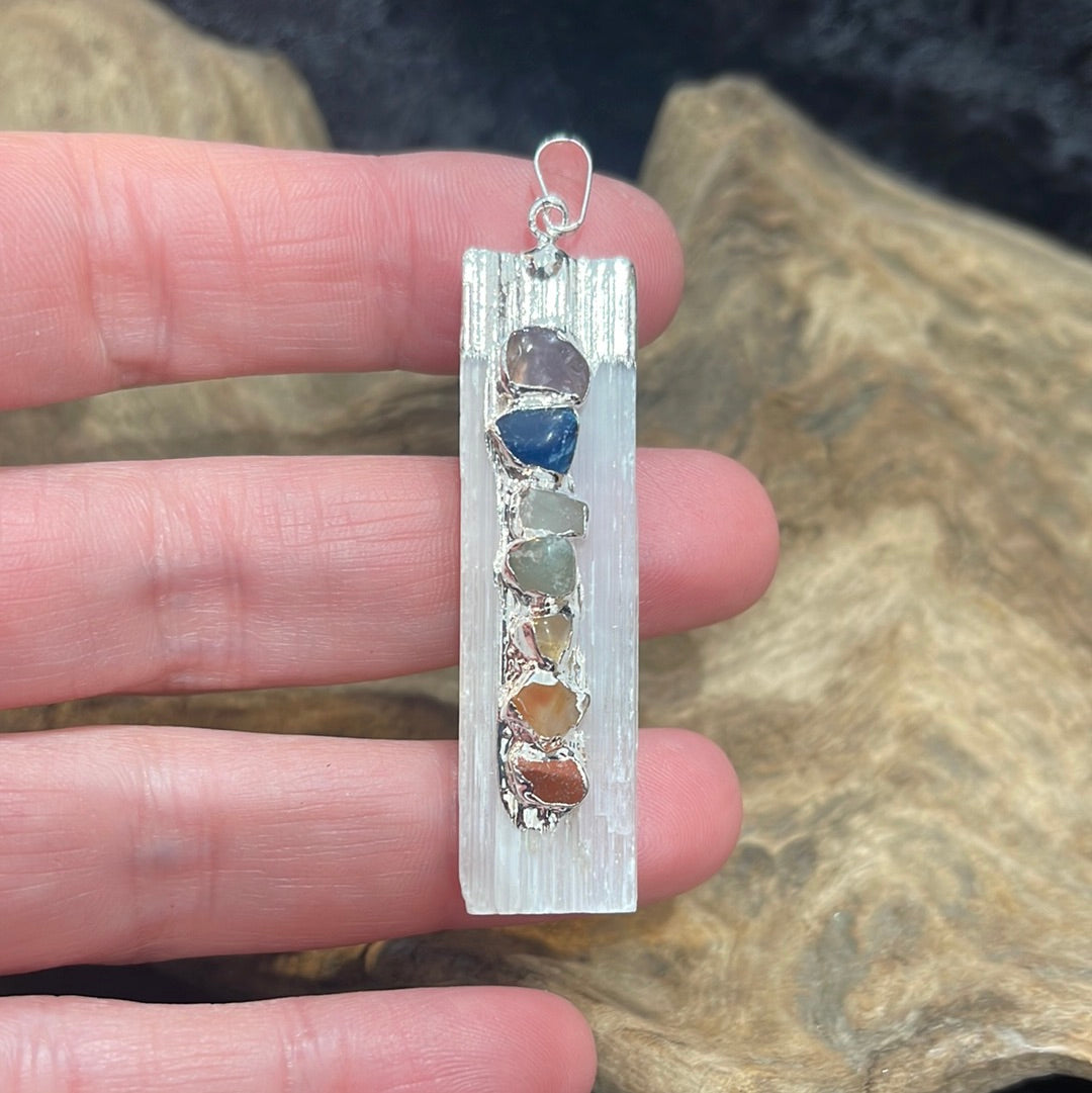 Points and Tumbled crystal pendants