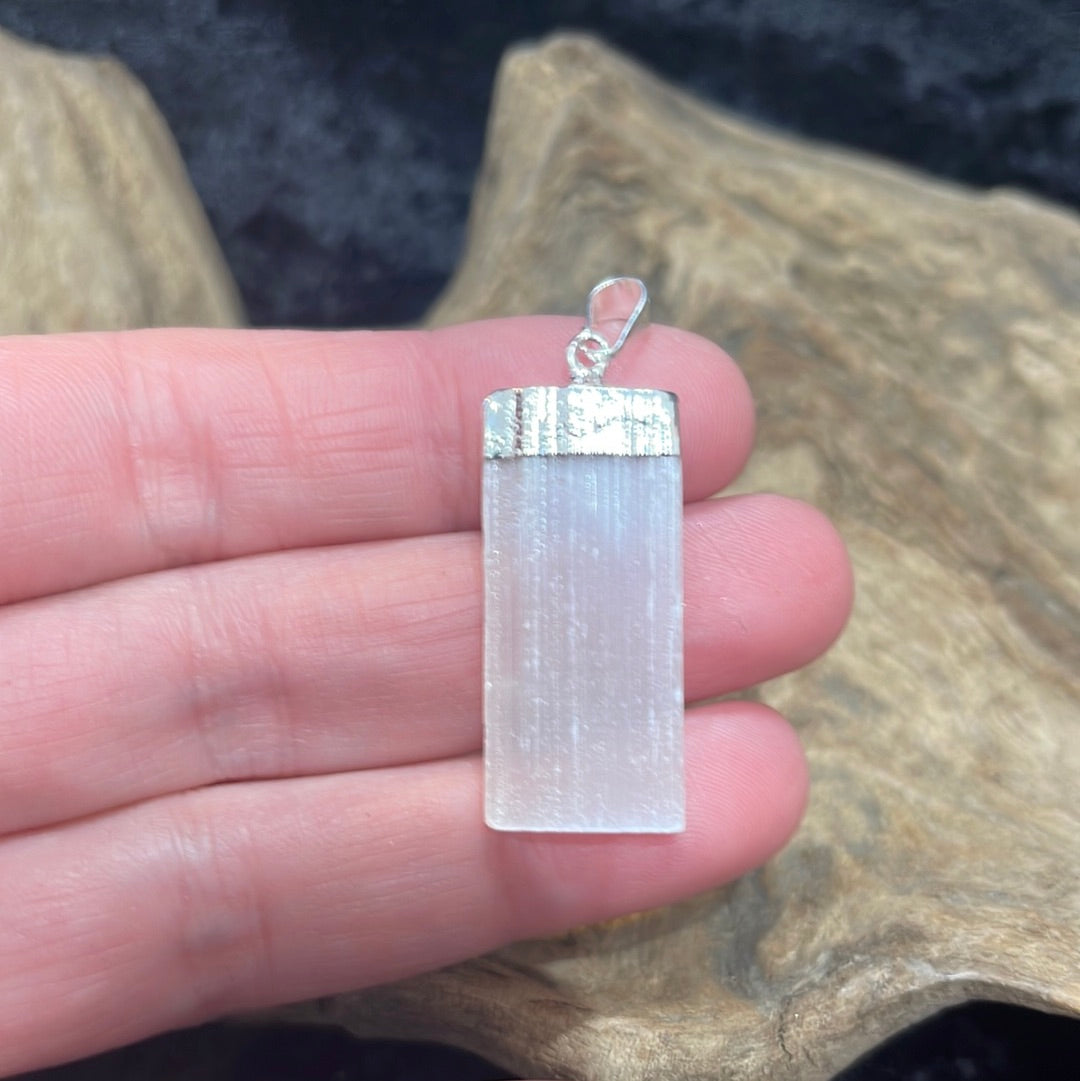 Points and Tumbled crystal pendants