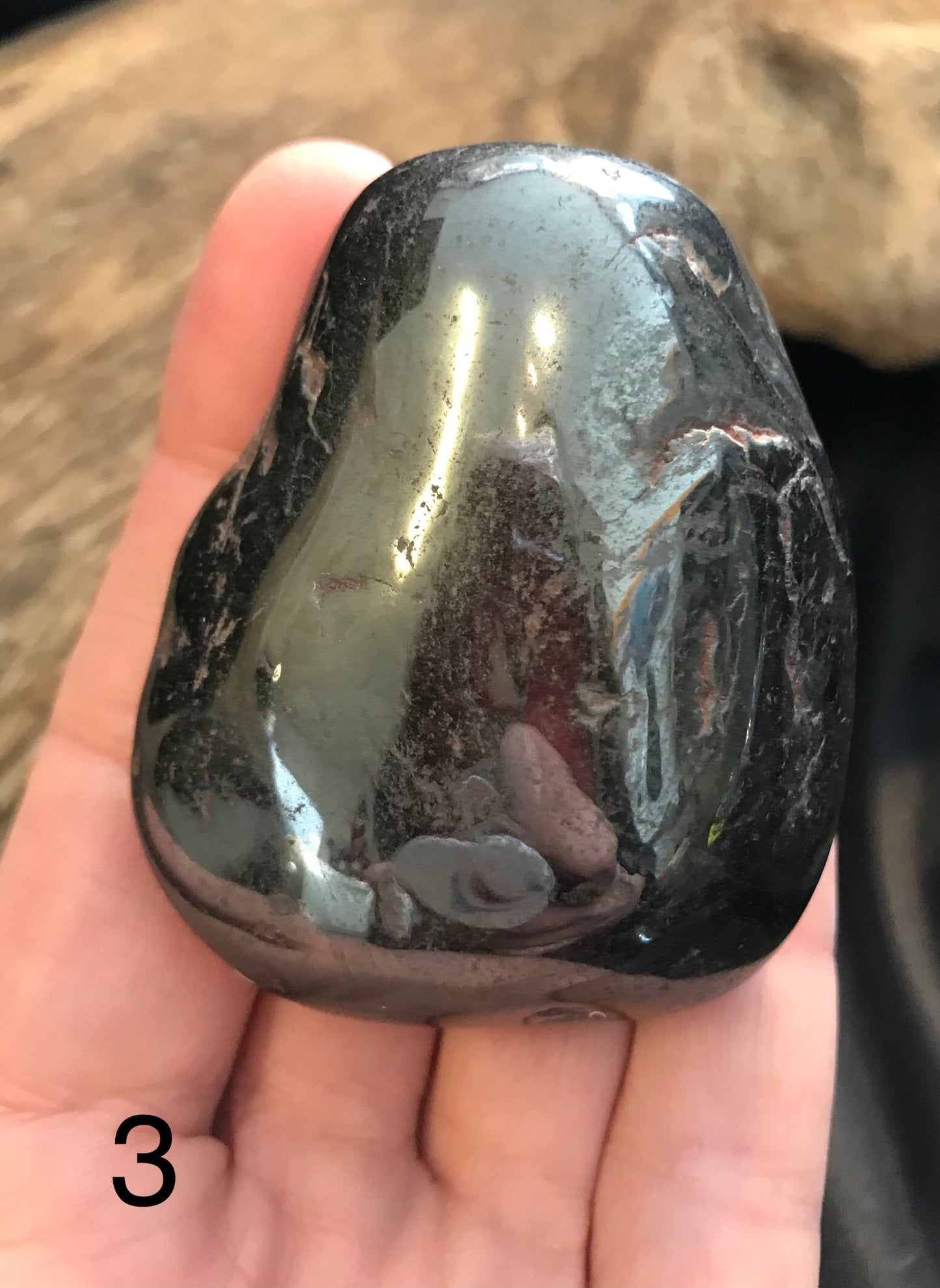 Hematite palm stone