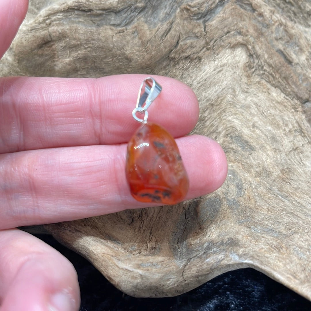 Points and Tumbled crystal pendants