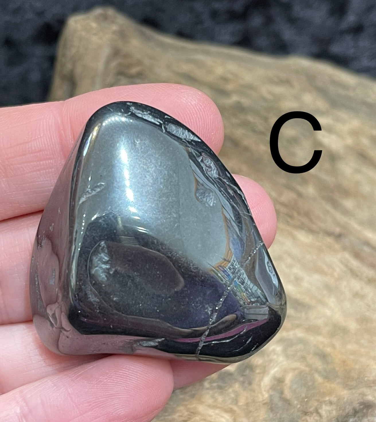 Hematite palm stone