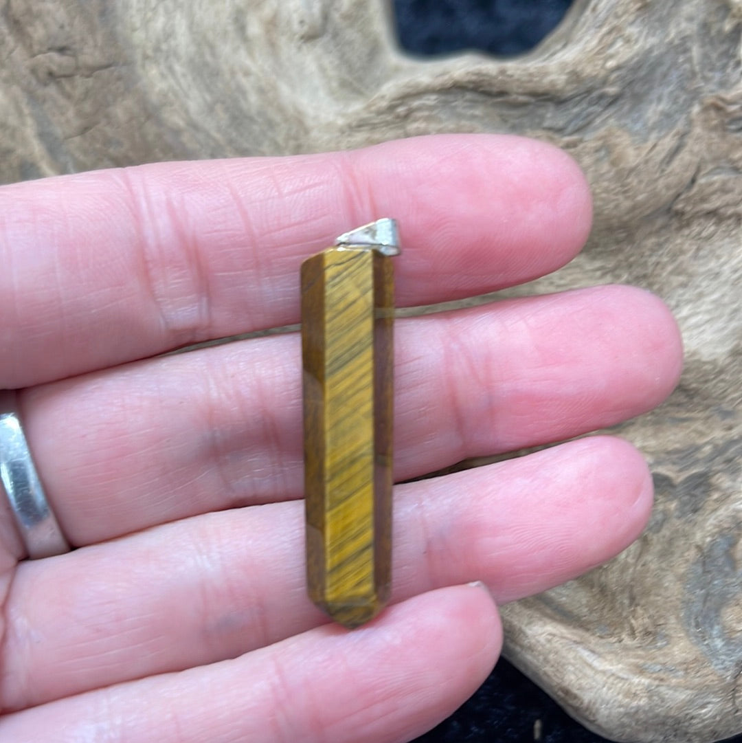 Points and Tumbled crystal pendants