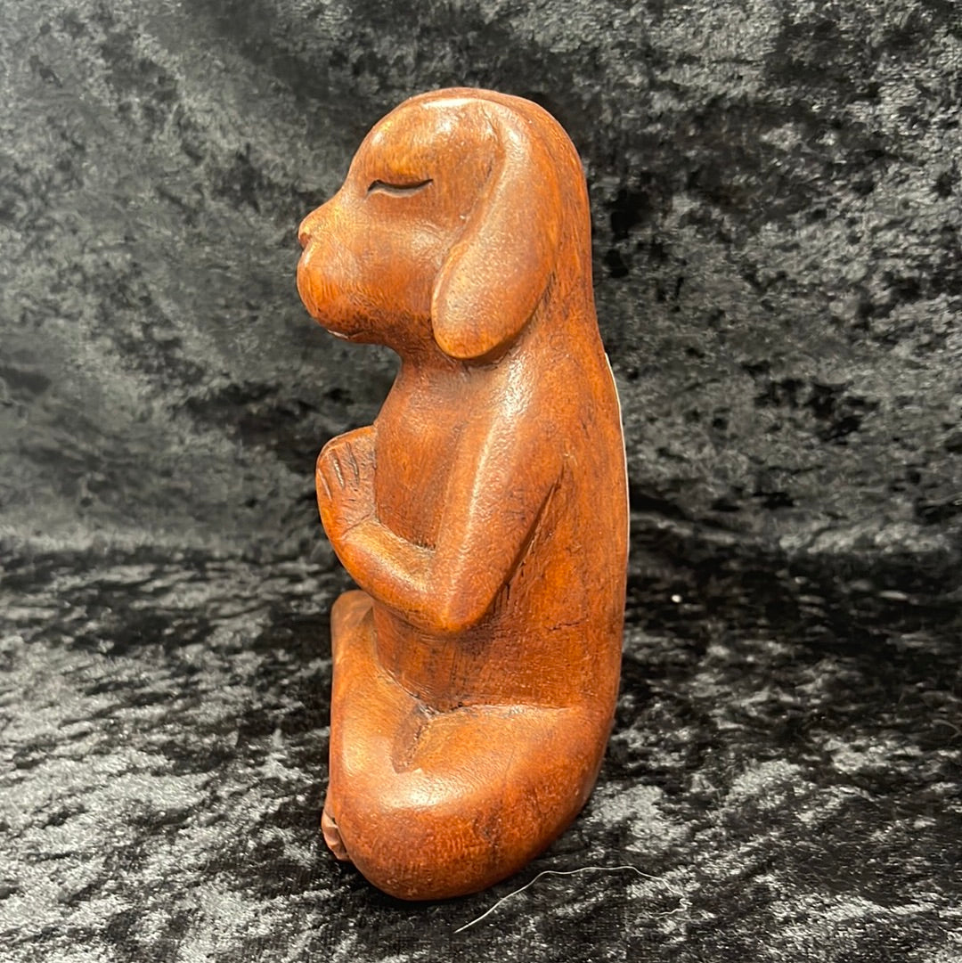 Wooden meditating figurines