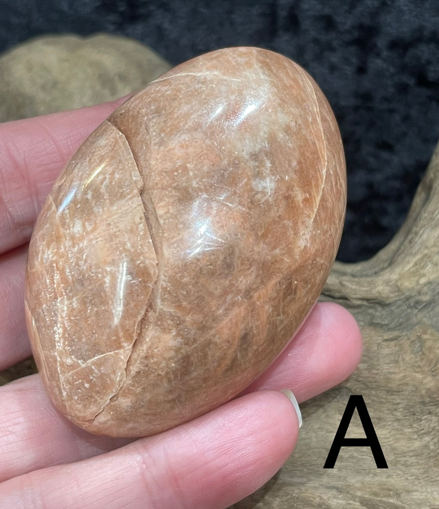 Peach Moonstone palm stones and spheres