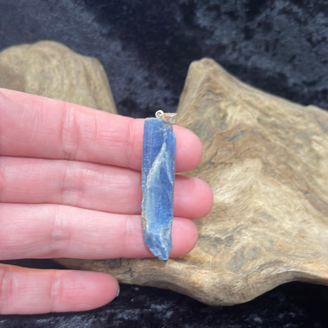 Points and Tumbled crystal pendants