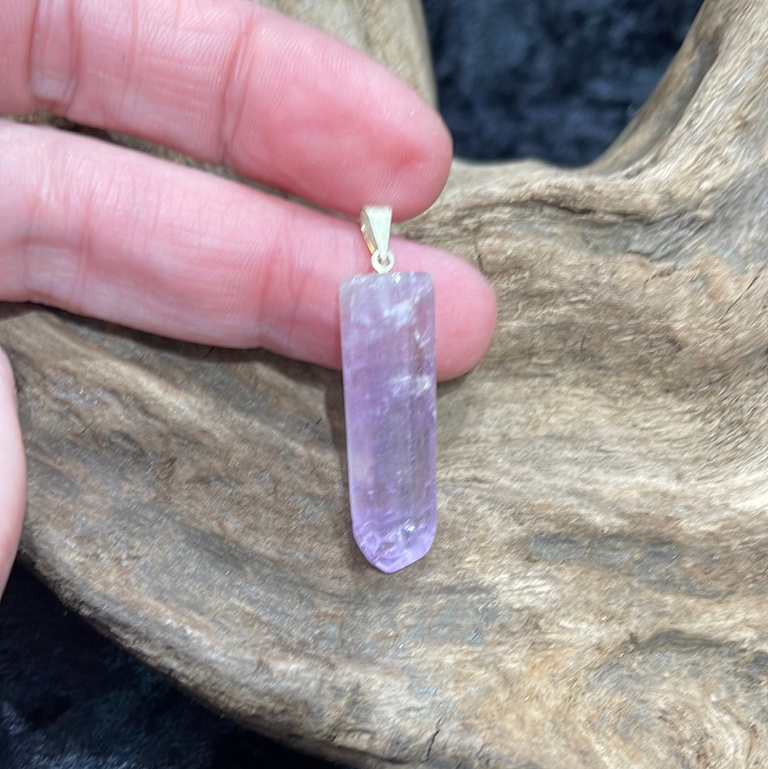 Points and Tumbled crystal pendants