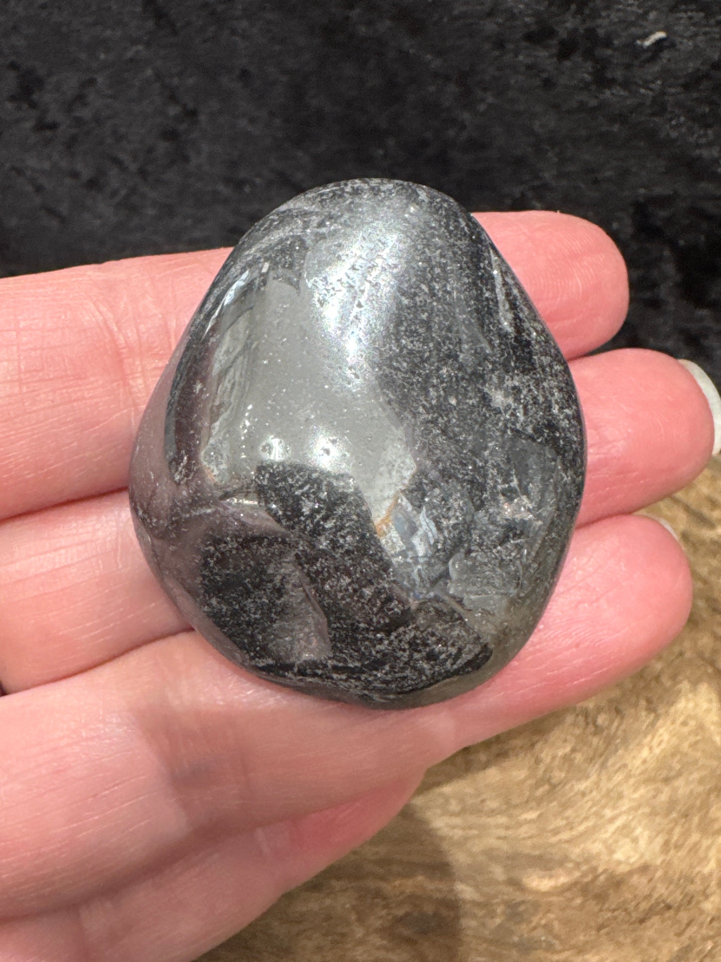 Hematite palm stone