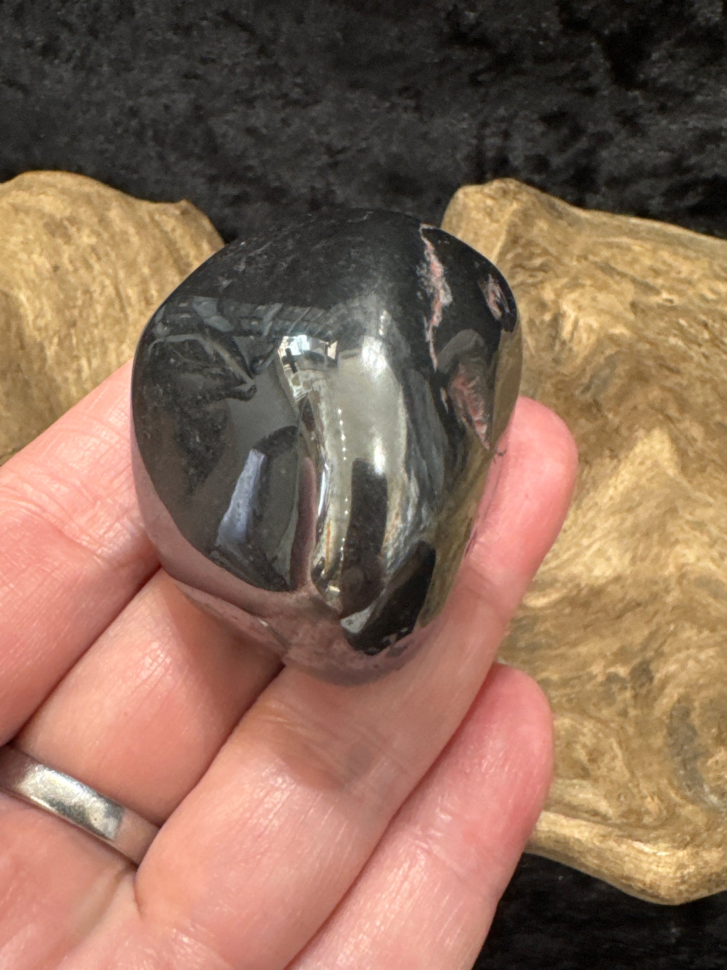 Hematite palm stone