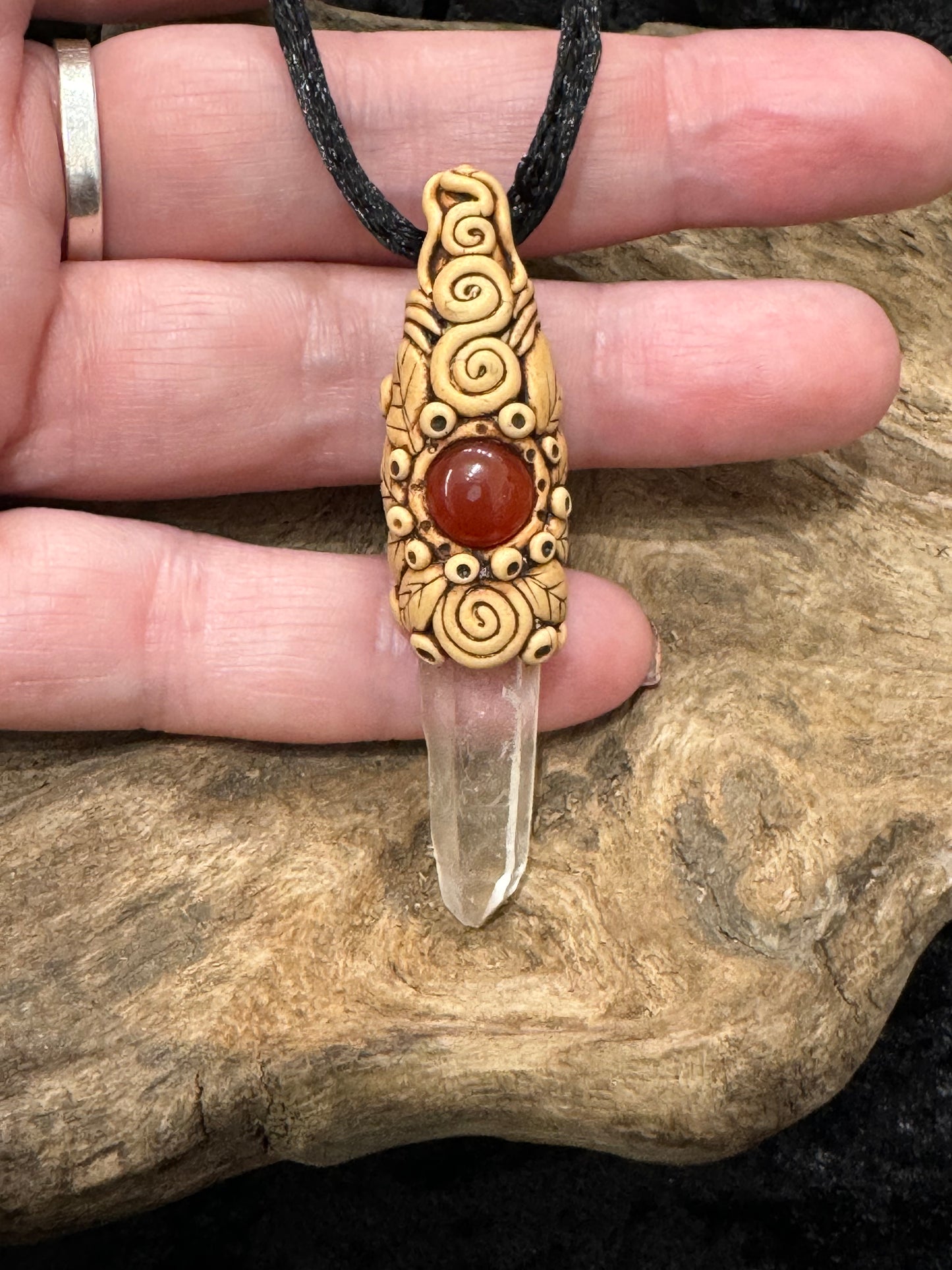 Quartz with carnelian pendant