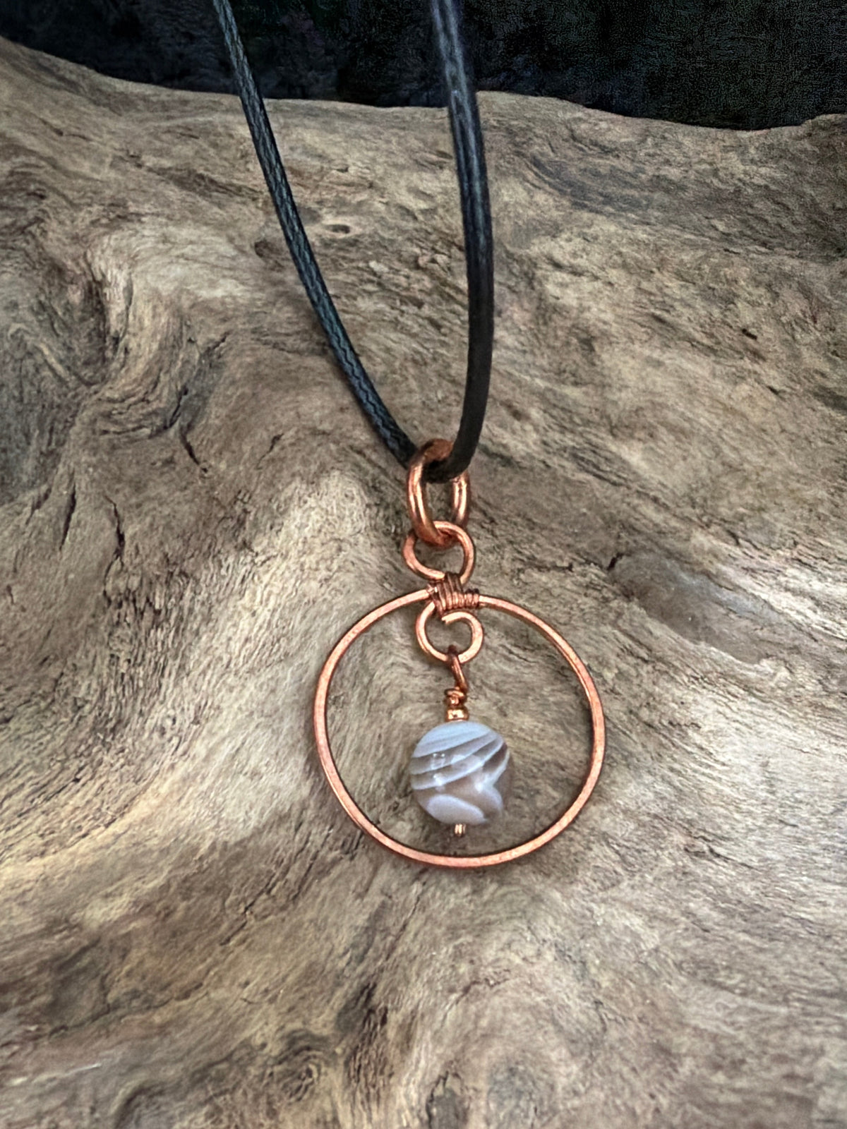 Circle of reflection Botswana agate pendant