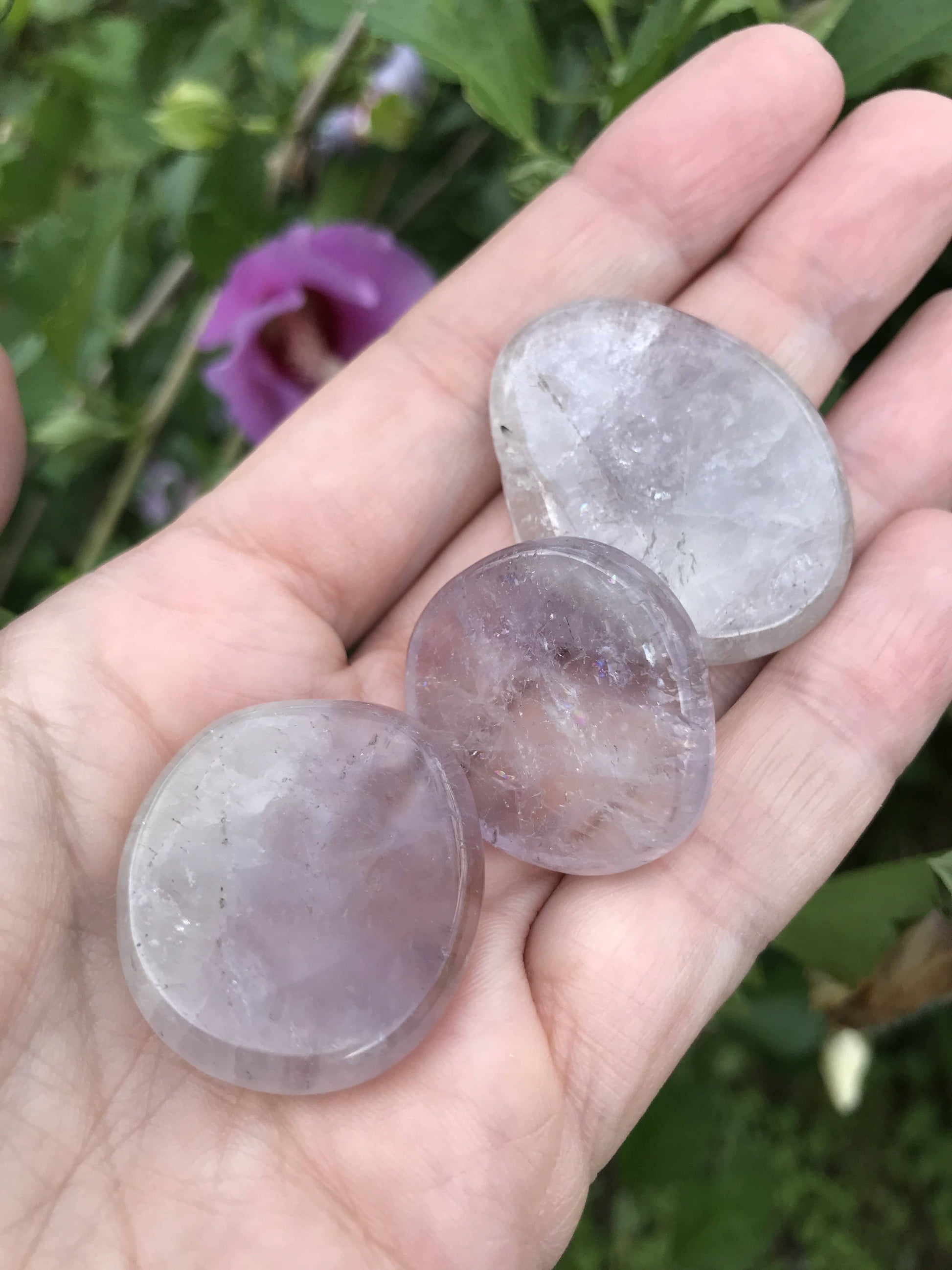 amethyst carved and polished into disk like shapes.