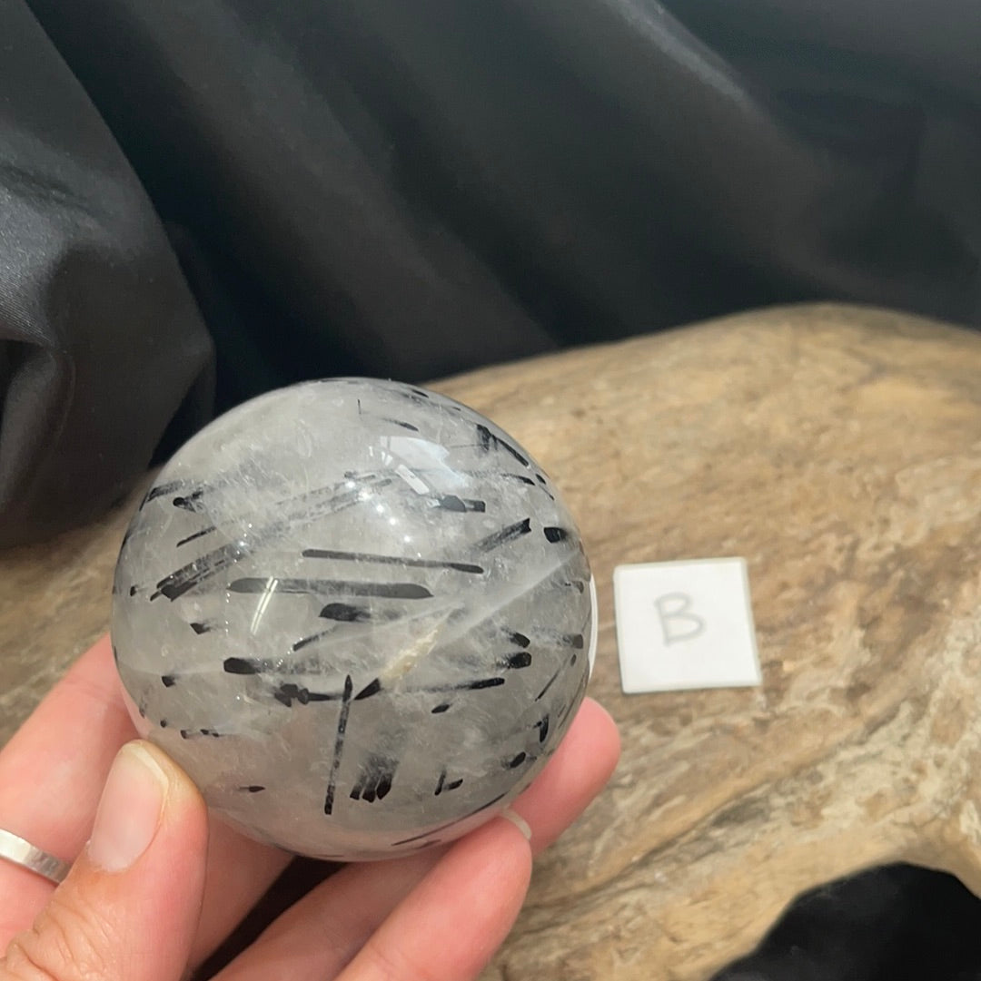 Tourmalinated quartz sphere