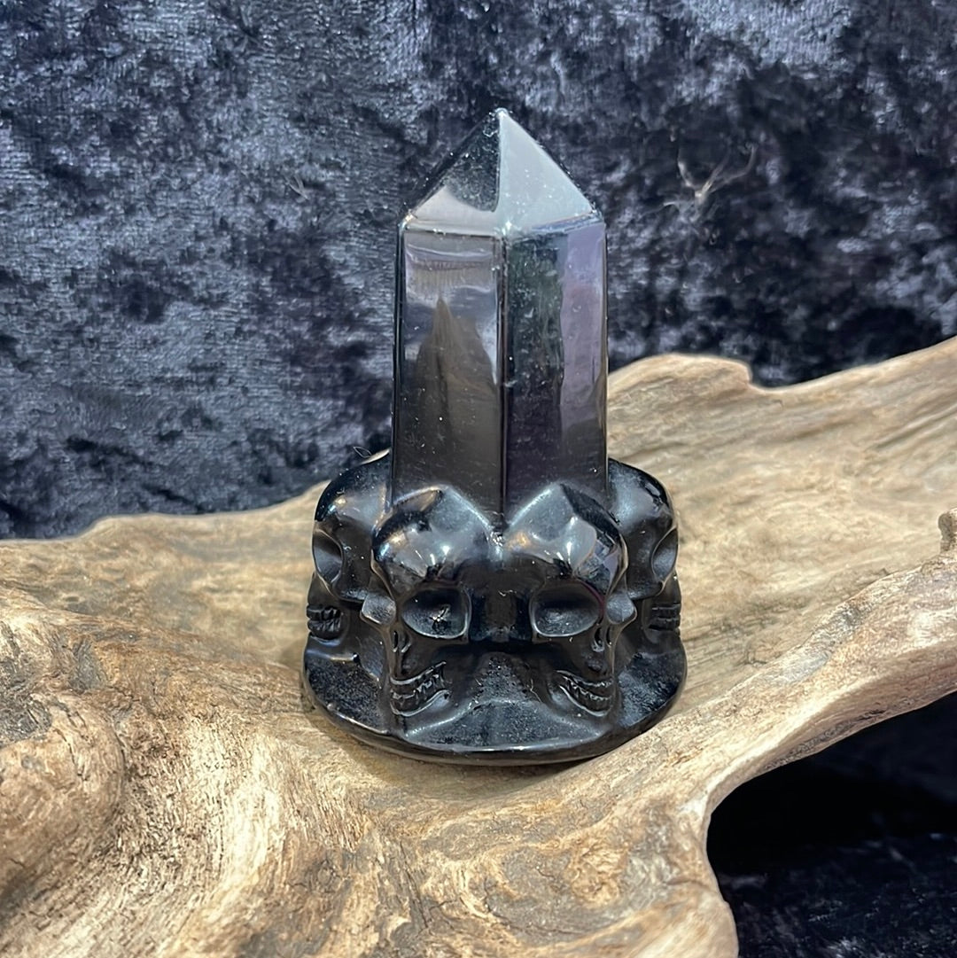 Obsidian tower with skulls