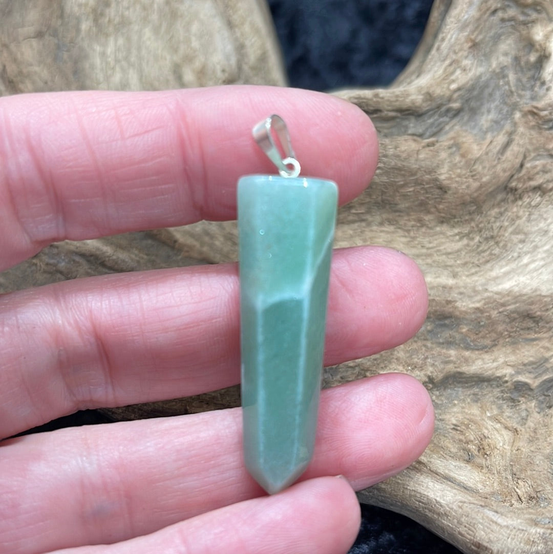 Points and Tumbled crystal pendants