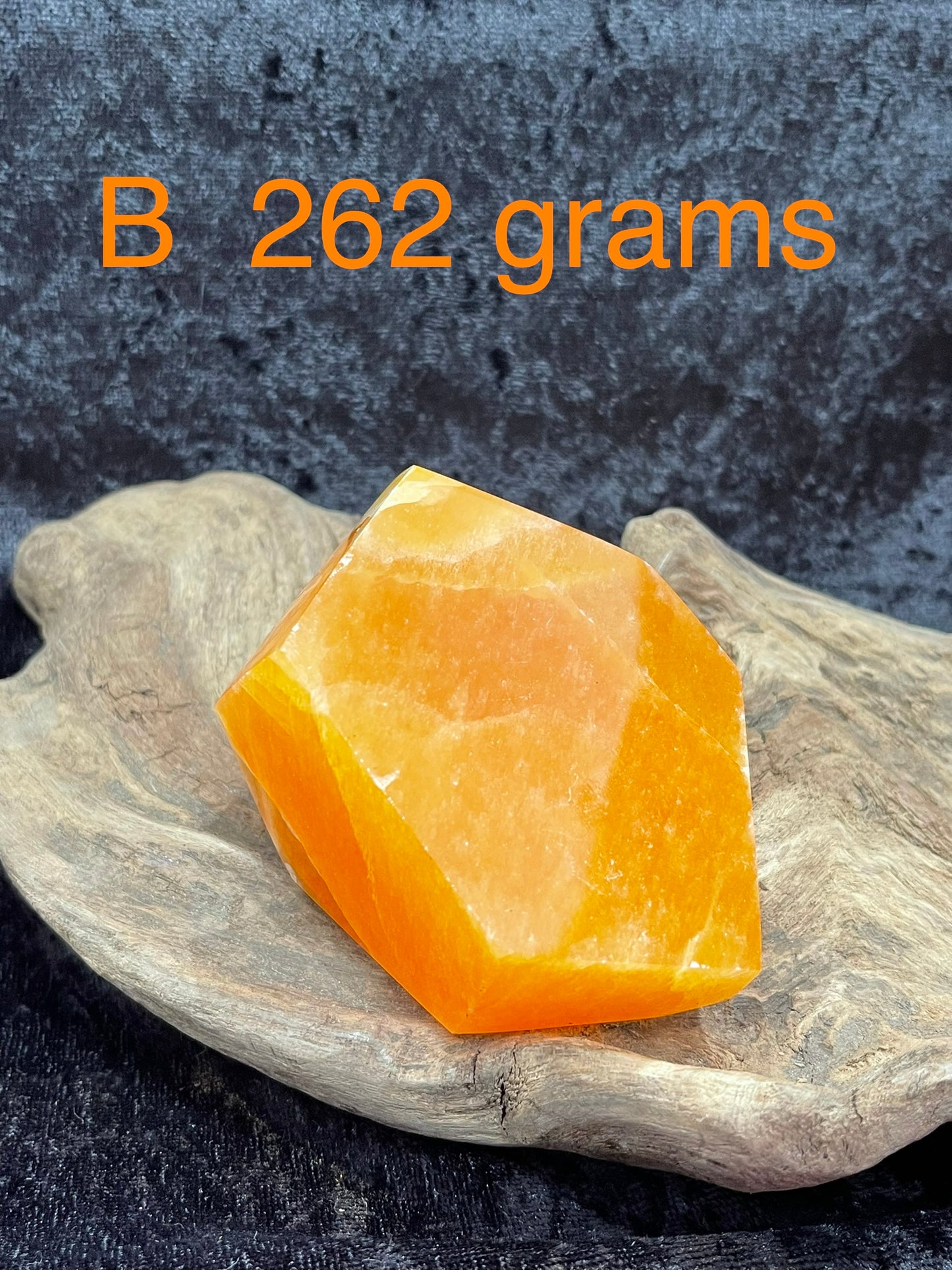 Orange calcite polished forms