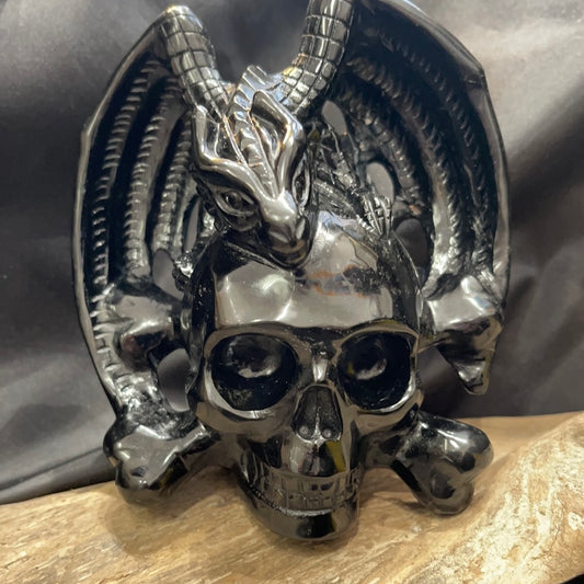Obsidian skull and crossbones with dragon