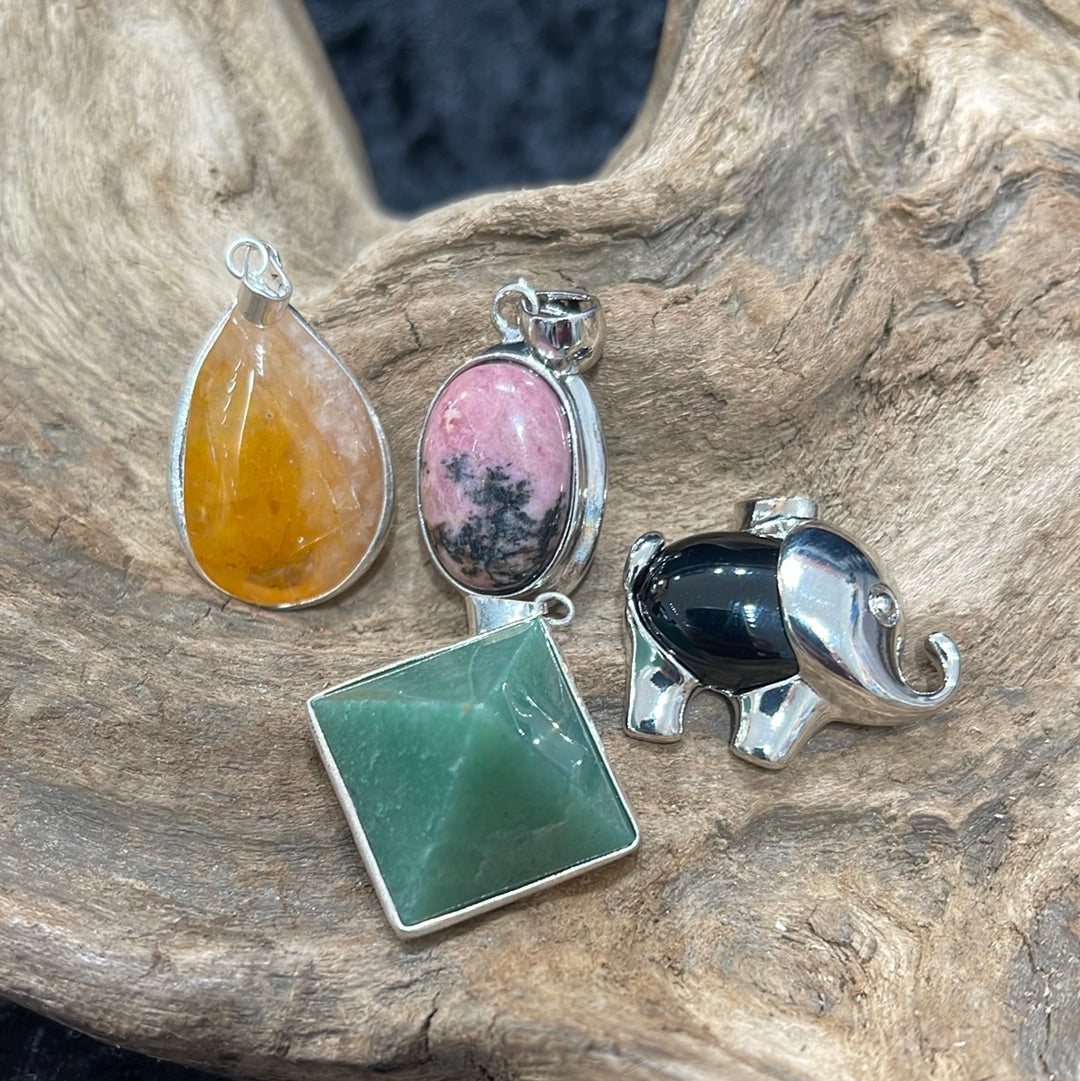 Bezel set crystal pendants