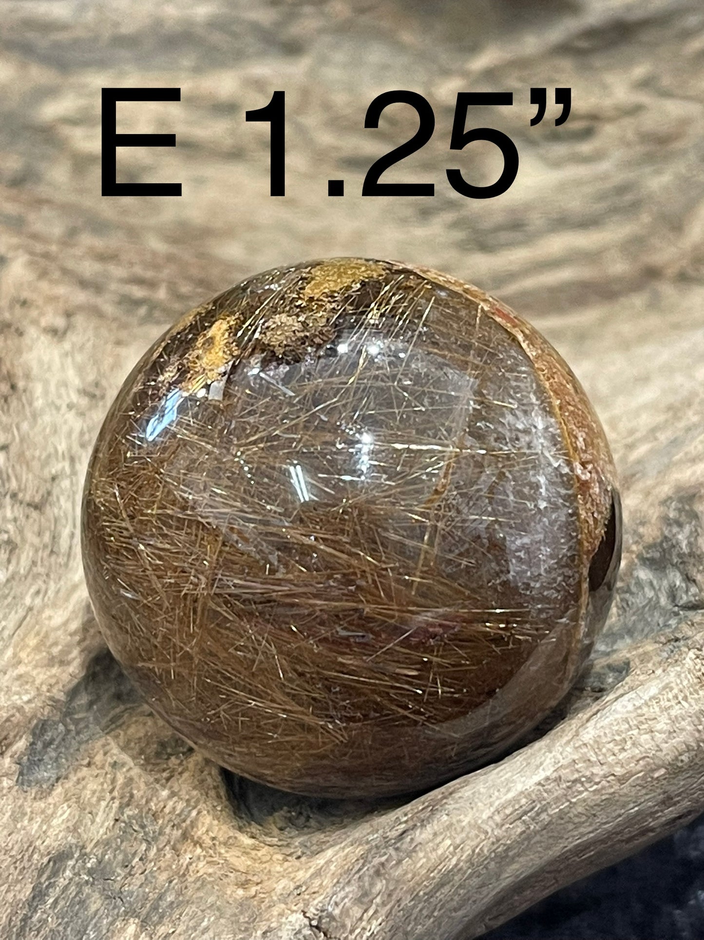 Lodolite rutilated spheres