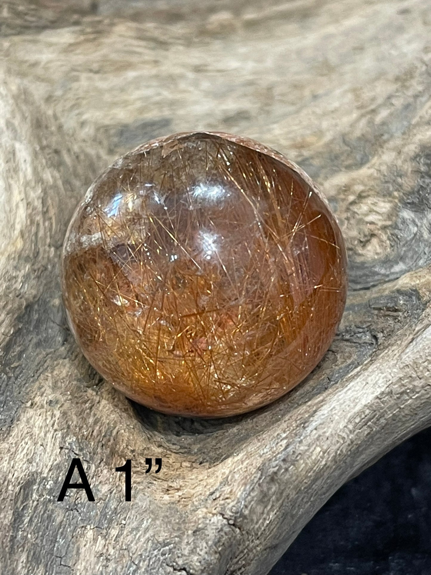 Lodolite rutilated spheres